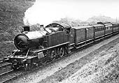 An unidentified ex-GWR 2-6-0 Mogul of the 53xx class variant is seen climbing Hatton Bank with a down express service to Snow Hill