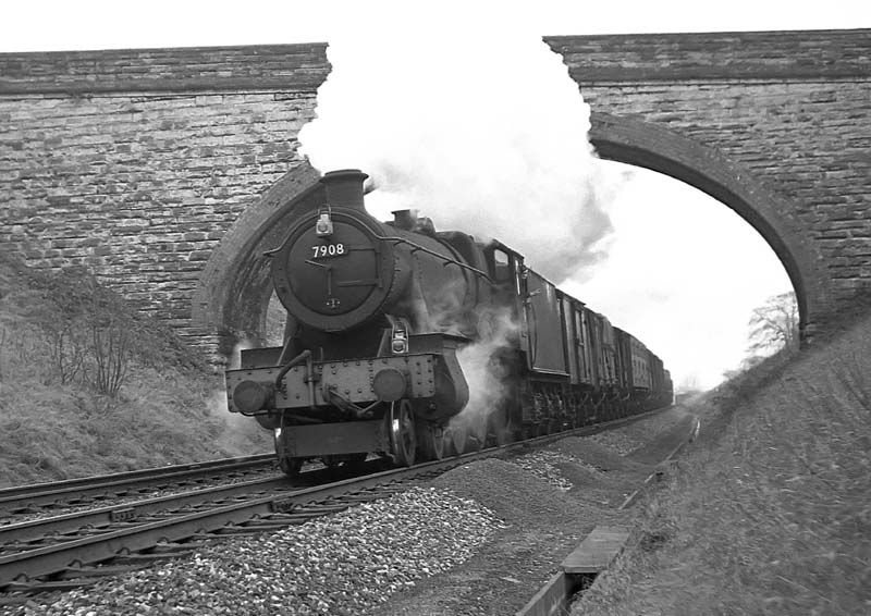 British Railways built 6959 Class 4-6-0 No 7908 'Henshall Hall' descends Hatton Bank on 28th March 1964