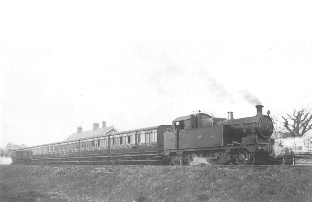 View of GWR 2-4-2T 36xx class No 3606 is seen standing at the head of a through working from Henley-in-Arden to Birmingham Snow Hill