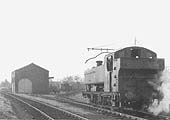 Ex-GWR 0-6-0PT 94xx class No 9432 is seen having just completed the shunting of the wagons into one of Henley-in-Arden's two long sidings