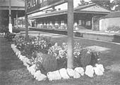 View of one of the many flower beds sited and maintained around station name boards and other areas of Henley-in-Arden station