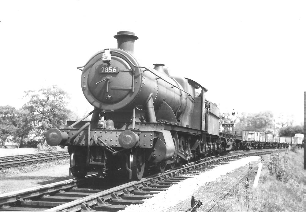 Ex-Great Western Railway 2-8-0 28xx class No 2856 reverses a class H 'through freight' train on to the Henley Goods line