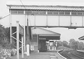 Close up showing the Stratford upon Avon end of the down platform buildings and the water crane located at the end of the platform