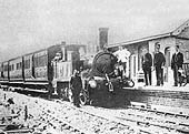 An unidentified GWR 0-4-2T 517 class locomotive stands at the head of a three-coach train comprising of four-wheel coaching stock
