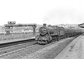 BR built 4-6-0 Modified Hall No 7919 'Runter Hall' passes through Hockley Station on the down main line