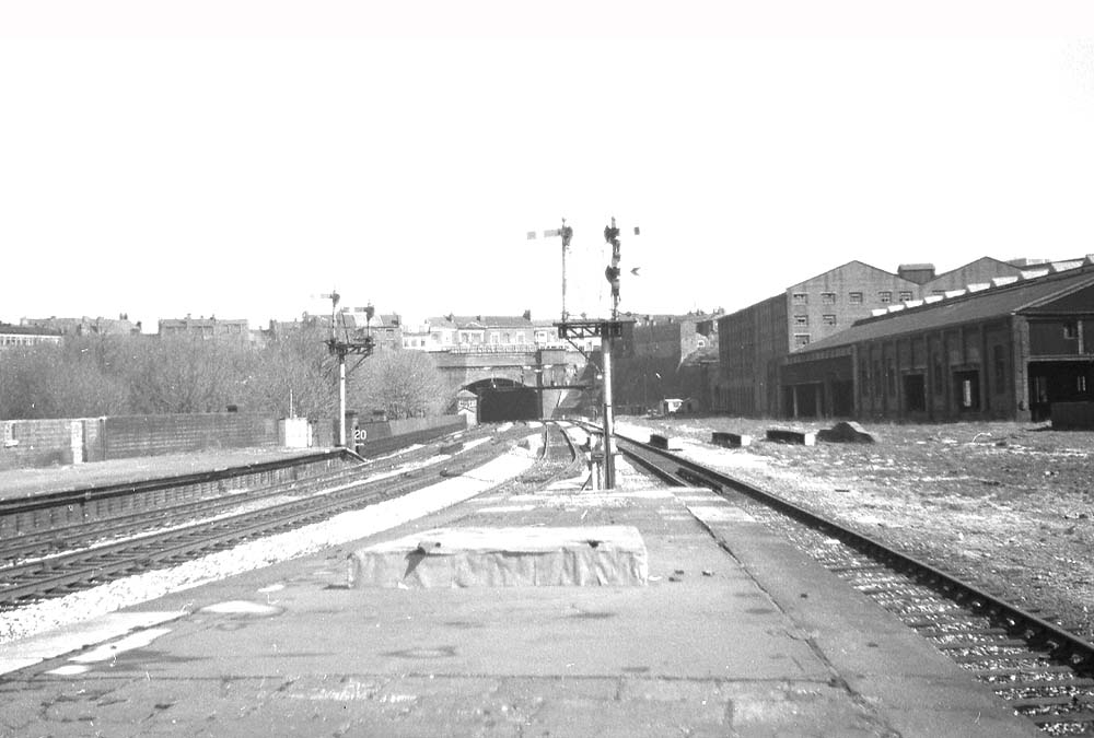 View of the Snow Hill end of the former station's platforms with the tunnel in the distance and signal box on the left