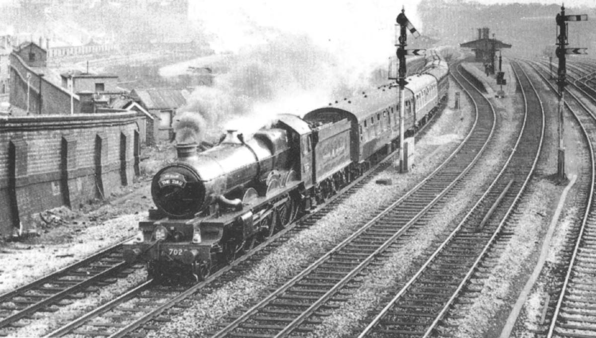 Ex-British Railways 4-6-0 Castle class No 7029 �Clun Castle� passes Hockley Station on the Down Main line with the Ian Allan �Zulu�
