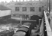 A later view showing the new 'Top' shed now complete and box vans being propelled through to the canal wharf