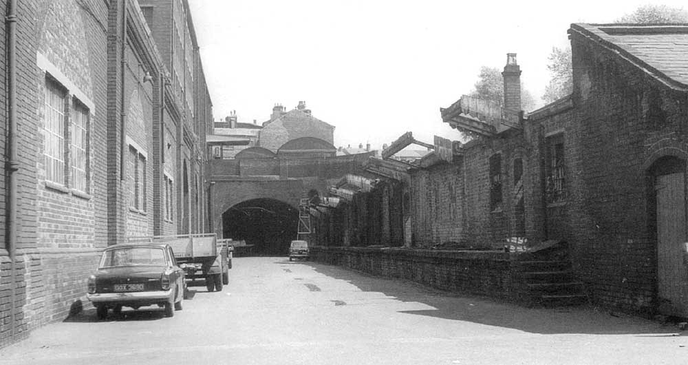 View from ground level of the tunnel which led under the railway to the passenger station circa 1967