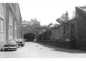 View from ground level of the tunnel which led under the railway to the passenger station circa 1967
