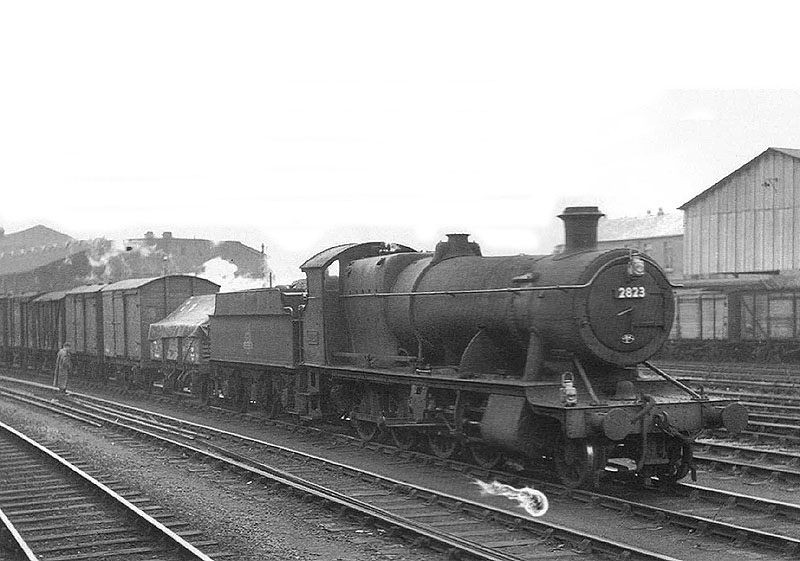 Ex Great Western Railway 2-8-0 28xx heavy freight class No 2823 stands on one of Hockley goods yard's sidings