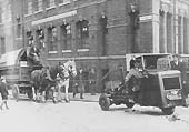A GWR Karrier Cob Mechanical Horse acting as the 'Chain Horse' in Pitsford Street with a two horse tilt van