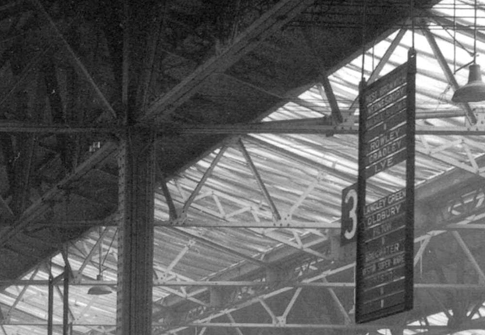 Close up showing the destination board suspended over each platform within Top shed and the list of destinations