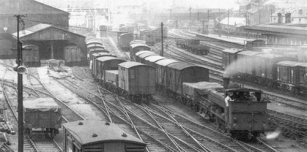 Looking towards Wolverhampton and showing the erection of the steelwork for the new 'Top' shed on 2nd August 1939