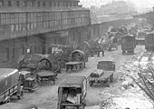 Close up showing the variety of road transport employed by the GWR for cartage at Hockley in 1940