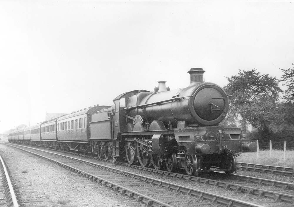 GWR 4-6-0 Star class No 4049 'Princess Maud' is seen at the head of an express approaching Knowle and Dorridge station in July 1925