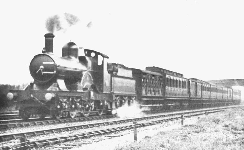 Great Western Railway 4-2-2 Dean Single 'Achilles' class No 3013 'Great Britain' on the 3:28 pm down local from Knowle & Dorridge