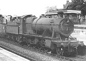 Ex-GWR 2-8-0 No 2833 is seen passing through the station's up relief line with a freight service circa 1951