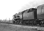 Ex-SR 4-6-2 Battle of Britain class No 34052 'Lord Dowding' heads a football special near Lapworth on 27th April 1963