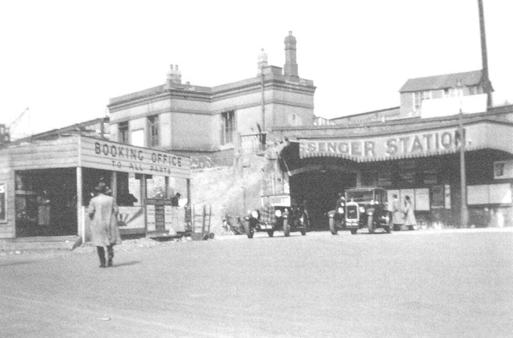 View of the temporary booking office erected next to the passenger under pass during the initial stages of rebuilding