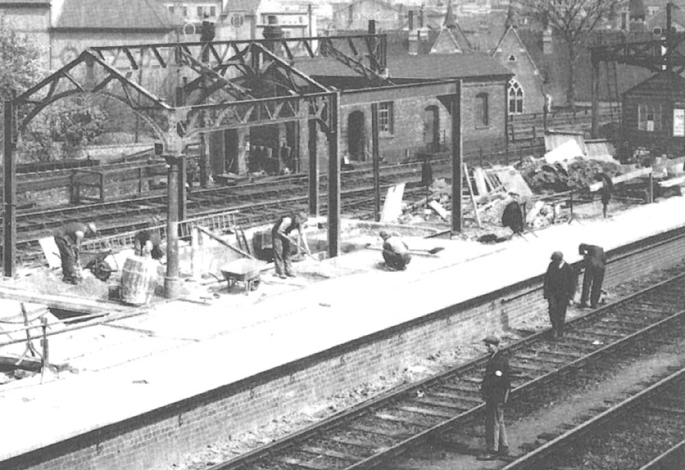 Close up showing the removal of the original station's steelwork located above the site of the steps to the station's new underpass