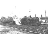 GWR 4-4-0 3252 (Duke) class No 3267 �Cornishman� with a full head of steam leaves Leamington�s up platform