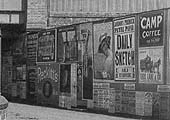 Close up showing a variety of advertising posters displayed on the bridge abutment and wall in Lower Avenue
