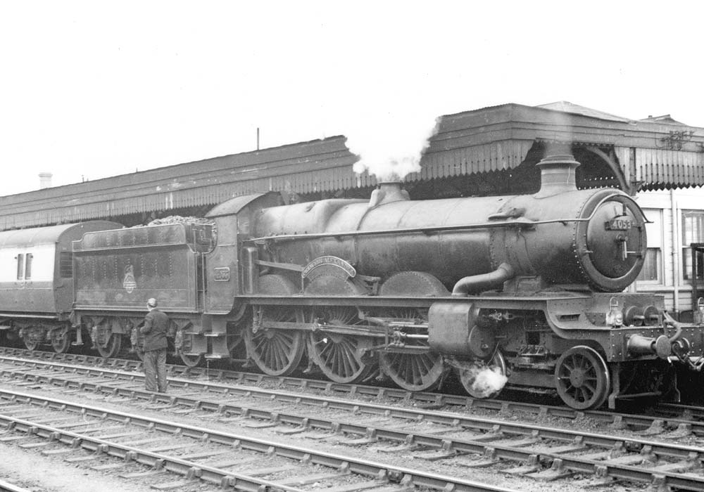 Ex-GWR 4-6-0 Saint class No 4053 'Princess Alexandra' is seen with the early British Railway 'Lion on a bike' totem on its tender