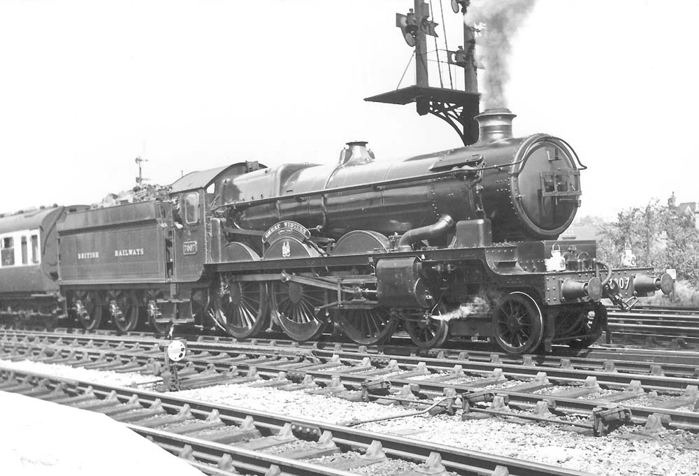 Ex-GWR 4-6-0 Castle class No 7007 'Great Western' stands gleaming in the sun at the head of an up express
