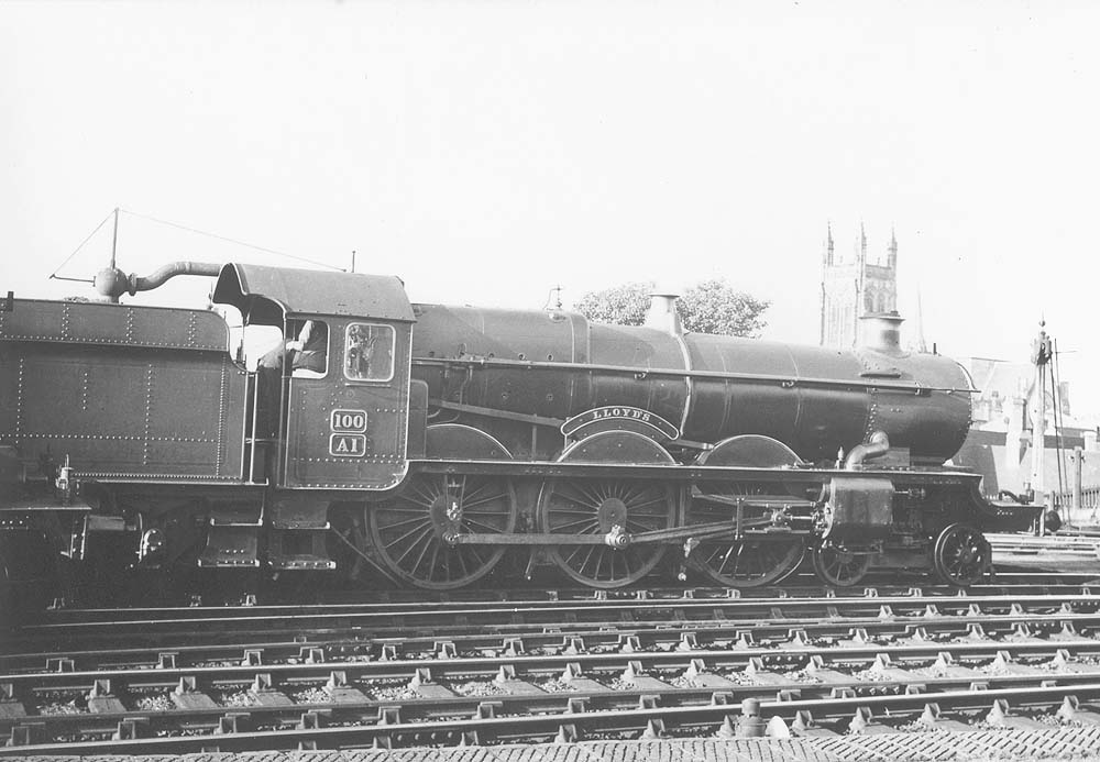 GWR 4-6-0 'Castle' class No 100 'A1 Lloyds' stands at the up platform waiting for the right away on up express