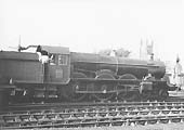 GWR 4-6-0 'Castle' class No 100 'A1 Lloyds' stands at the up platform waiting for the right away on up express