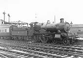GWR 4-4-0 No 3821 'County of Bedford' stands at the up platform on an up stopping train shortly before withdrawal