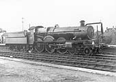 Great Western Railway 4-6-0 No 4018 'Kinght of the Grand Cross' stands light enginge on the middle road