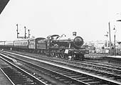 GWR 4-6-0 No 4912 'Berrington Hall' arrives at the up platform with an express to Paddington circa 1938