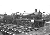 Great Western Railway 4-6-0 No 4913 'Baglan Hall' is seen standing at the head of an up express service
