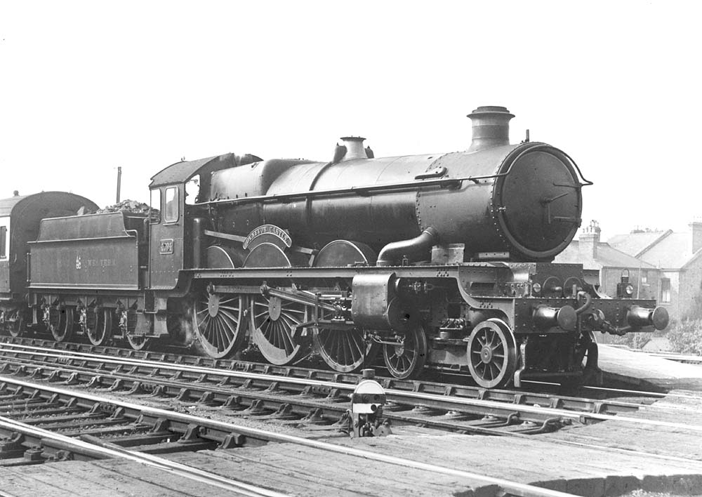 GWR 4-6-0 No 4094 'Dynevor Castle' pauses at the up platform on a Banbury bound train