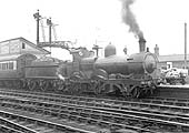 GWR 2-4-0 'Barnum' class No 3210 stands at the head of an an up local passenger train circa 1932