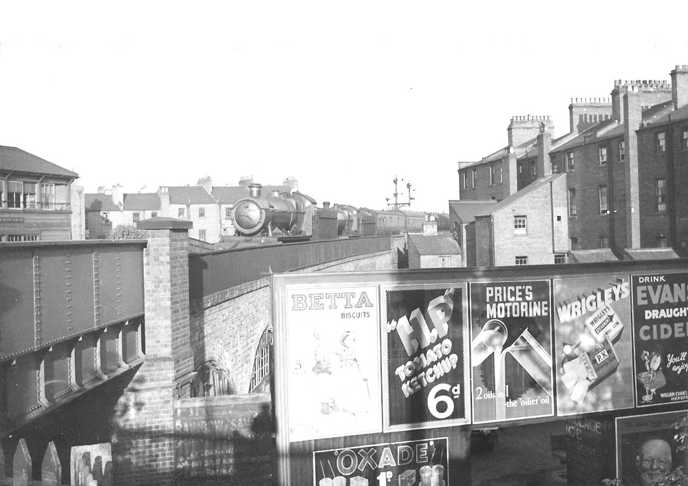 A pair of GWR engines are seen just about to cross Lower Avenue bridge prior to arriving at Leamington station