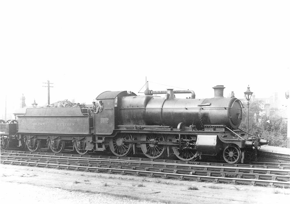 GWR 2-6-0 Mogul No 6357 waits for the right of way whilst at the head of an up goods train circa 1929