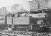 GWR 36XX class 2-4-2T No 3606 arrives at the up platform at the head of an up local passenger train circa 1928