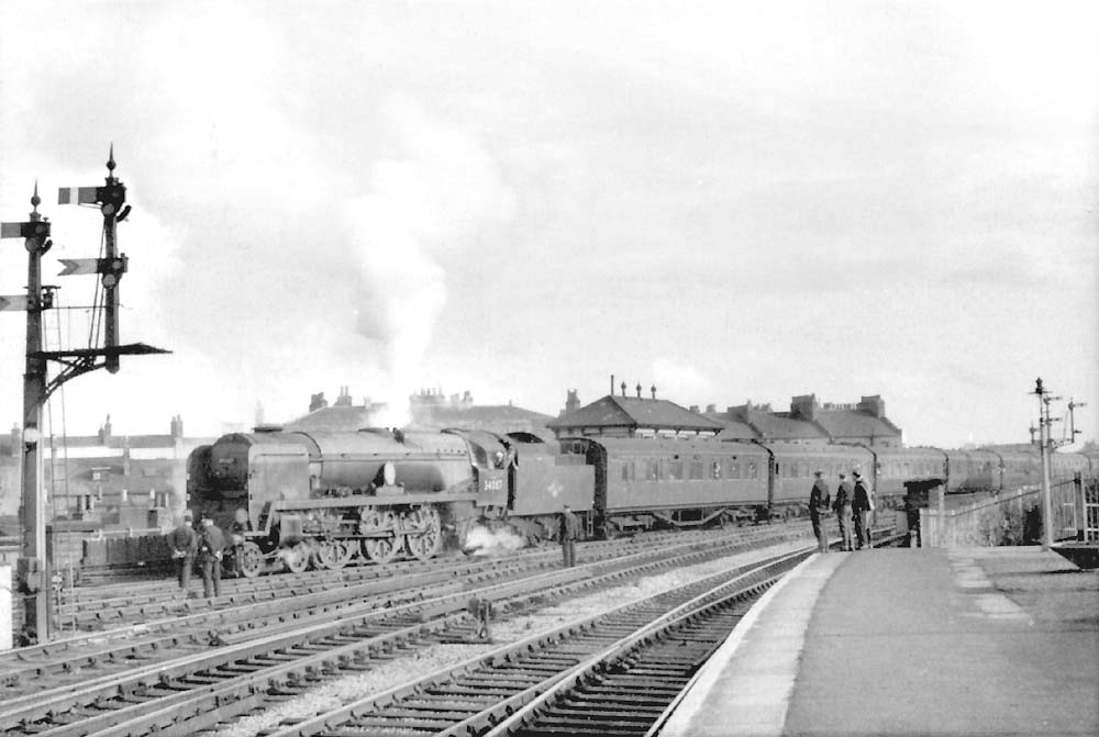 Rebuilt West Country Class 4-6-2 No 34087 crosses over to the former LNWR lines with a Bournemouth to Coventry football special on 3rd November 1962
