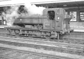 Ex-GWR 57xx Class 0-6-0PT No 9636 blows off steam when paused at Leamington station on 5th October 1963