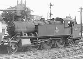 Ex-GWR 5101 Class 2-6-2T No 4106 stands bunker first at the head of an up local service on 4th August 1951