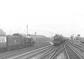 An unidentified ex-GWR Castle Class 4-6-0 locomotive enters the road to the up platform on 3rd September 1955