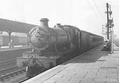 Ex-GWR 4-6-0 49xx Class No 6933 'Birtles Hall' is seen entering Leamington station with a four coach local train in the  early 1950s