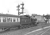 An unidentified ex-GWR 4-6-0 Castle Class locomotive approaches Leamington South Signal Box on a Wolverhampton to Paddington service circa 1952