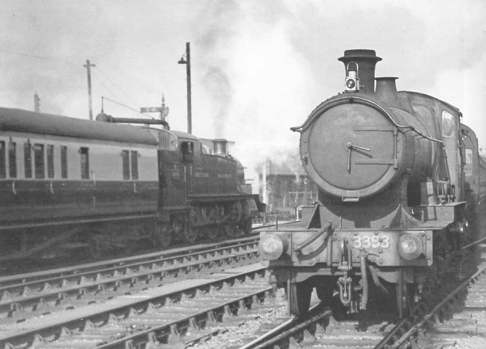 Ex-GWR 33xx 4-4-0 Class No 3393 'Australia' coasts into the up platform with a morning service on 7th May 1948