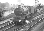 Ex-GWR 4073 Class 4-6-0 No 5054 ' Earl of Ducie' is seen departing from Leamington's up platform in 1964