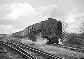 BR 2-10-0 9F No 92138 passes Leamington shed with an iron ore train for South Wales on 11th April 1965