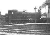 GWR 2-6-2T No 3902, a Tyseley based locomotive, is seen on the goods loop at west end of station